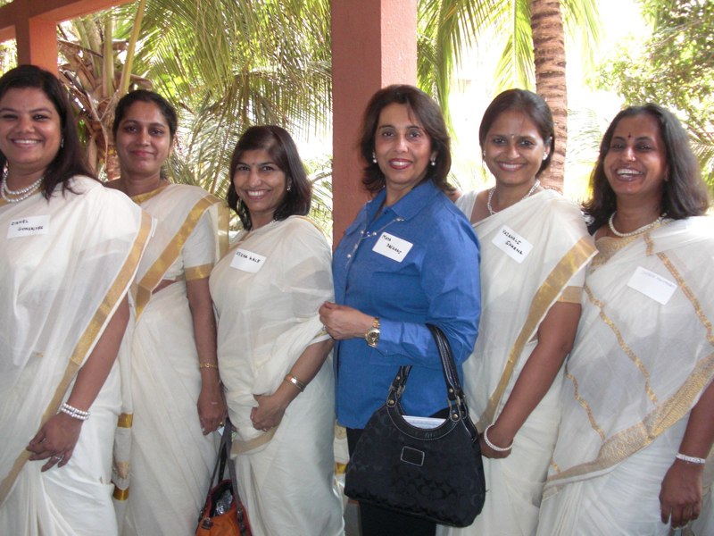 Women attending a professional development session with Maya Daswani