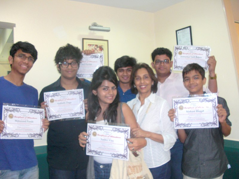 Young Persona Power learners with their course certificates