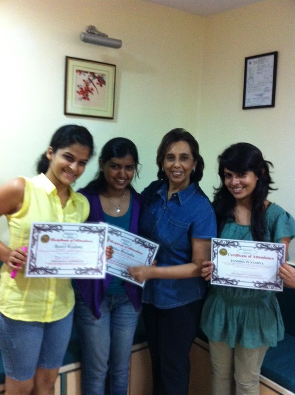 Young women with Maya Daswani after their training